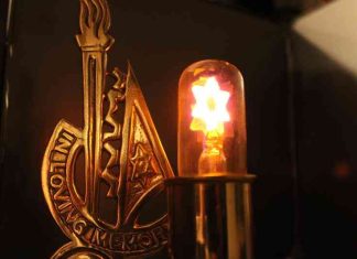Yahrzeit Candle taken by Maddie Renert for That Chilly, Gray Office by Sion Cohen