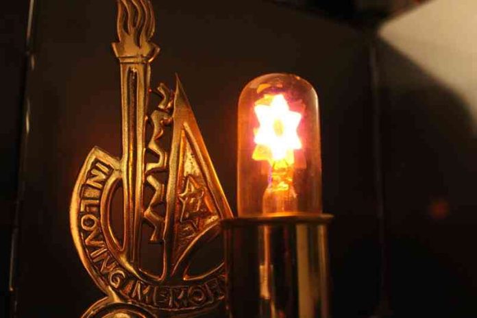 Yahrzeit Candle taken by Maddie Renert for That Chilly, Gray Office by Sion Cohen